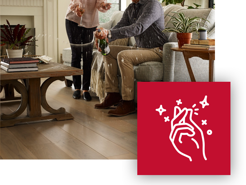 Couple spilling champagne on a durable Floorte floor